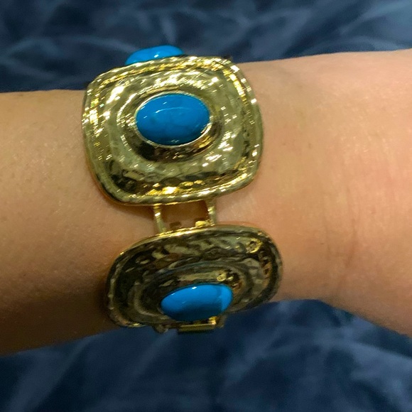 Gold-coloured and turquoise coloured articulated braceket - Picture 1 of 3